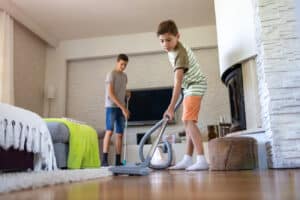 Boy Helping with Household Chore