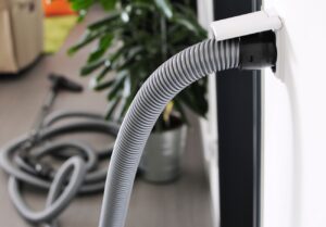 Improve Indoor Air Quality with a Central vacuum plugged into the wall.